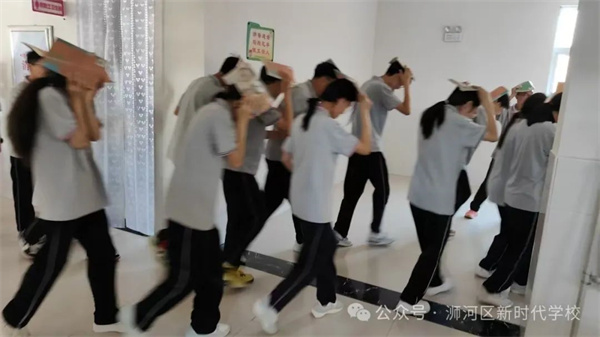 筑牢安全防线！浉河区新时代学校开展地震应急演练