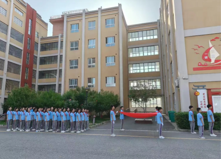 正阳县第十四小学六二班“传承星星火,点亮星之光”主题升旗仪式