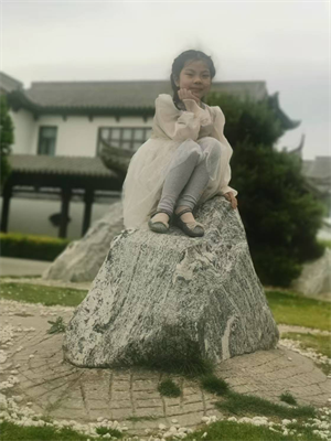 李